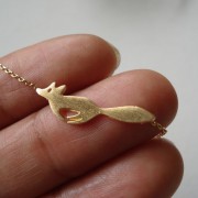 100766-Delicate-gold-silver-fox-necklace-hand