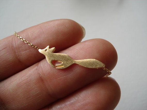 100766-Delicate-gold-silver-fox-necklace-hand